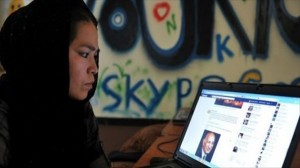 An-Afghan-Muslim-woman-browses-the-Facebook-website-at-the-Young-Women-For-Change-internet-cafe-in-Kabul.-Image-via-AFP.